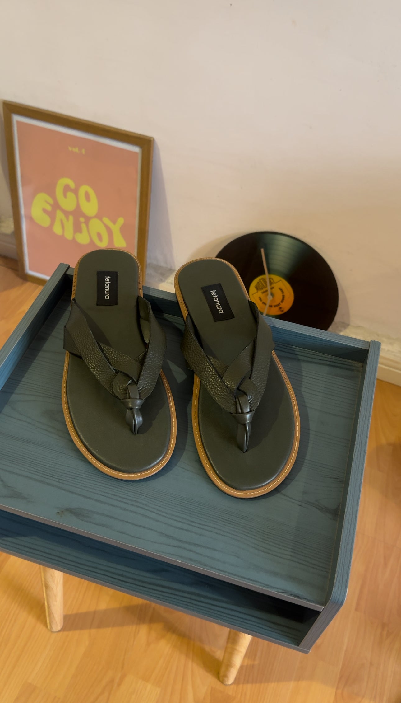 Green leather footwear