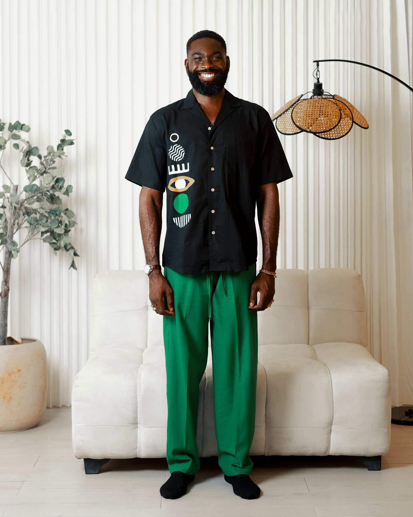 Black boho art short sleeve shirt x green linen pants
