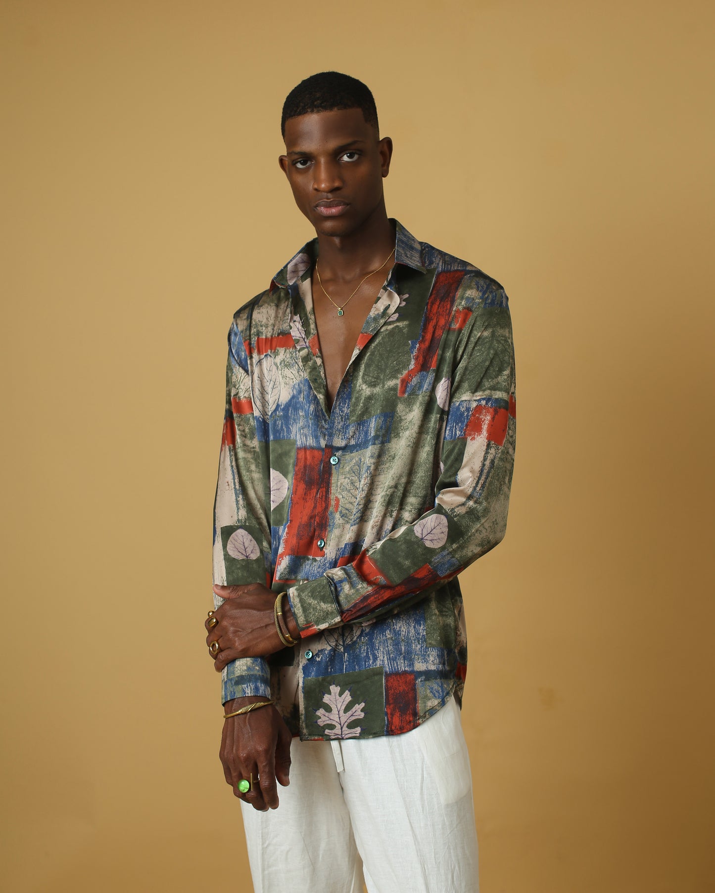 Deep green red silk shirt.