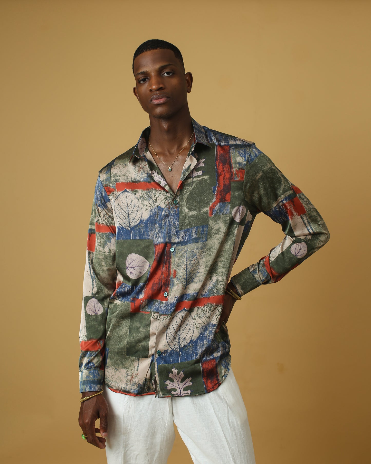 Deep green red silk shirt.
