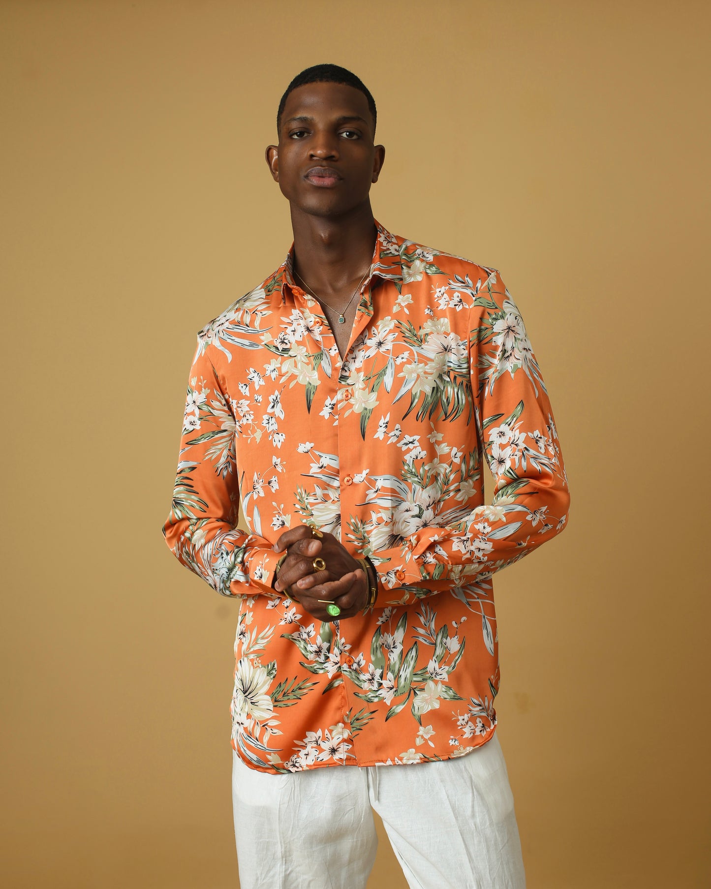 Orange floral silk shirt.