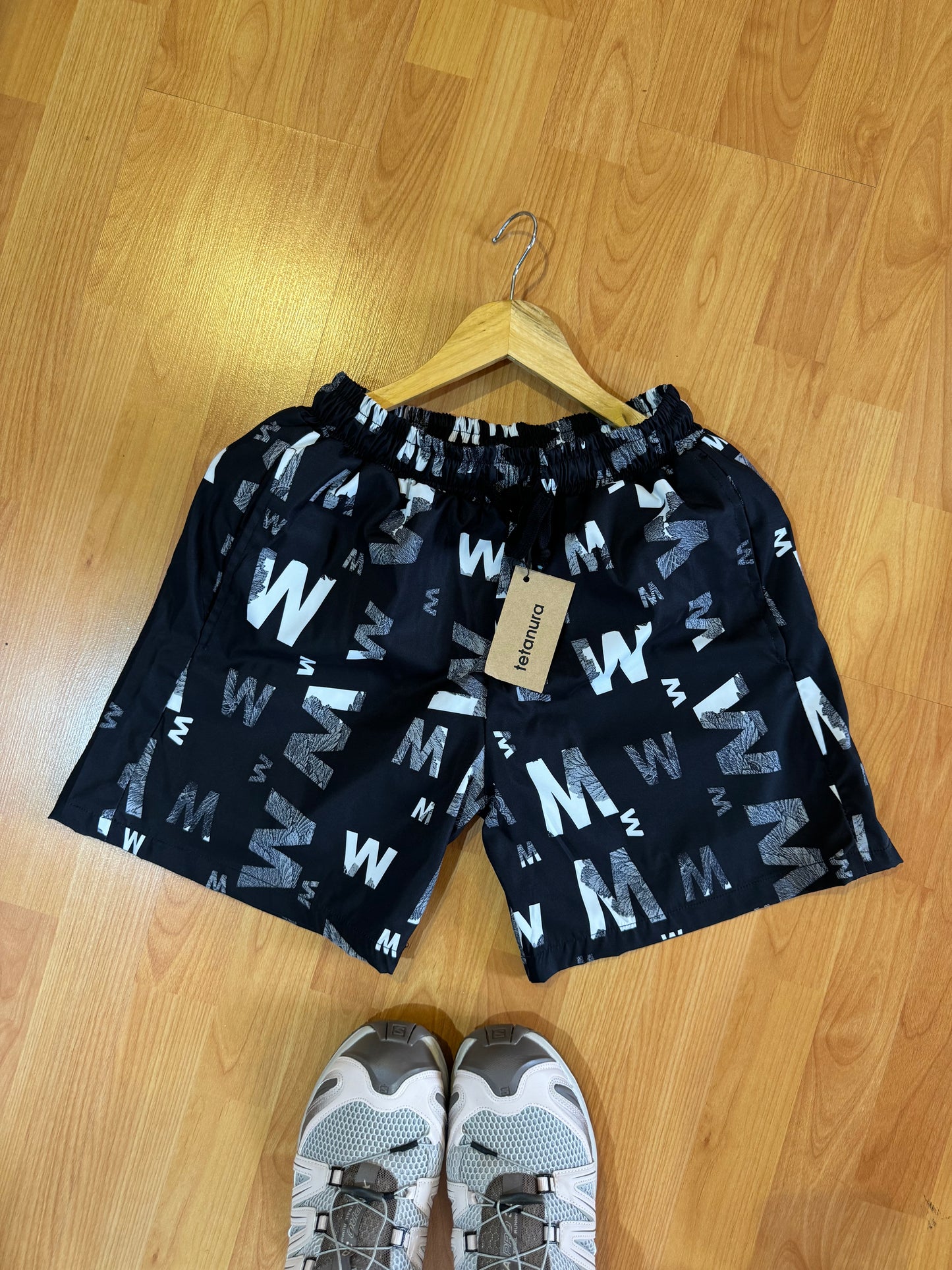 Blue black white W print shorts
